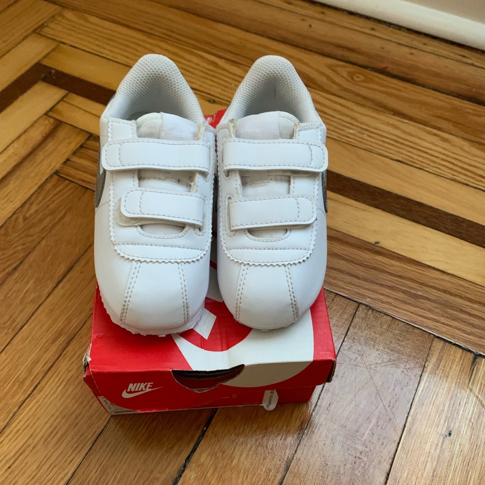 White toddler Cortez Nike sneakers